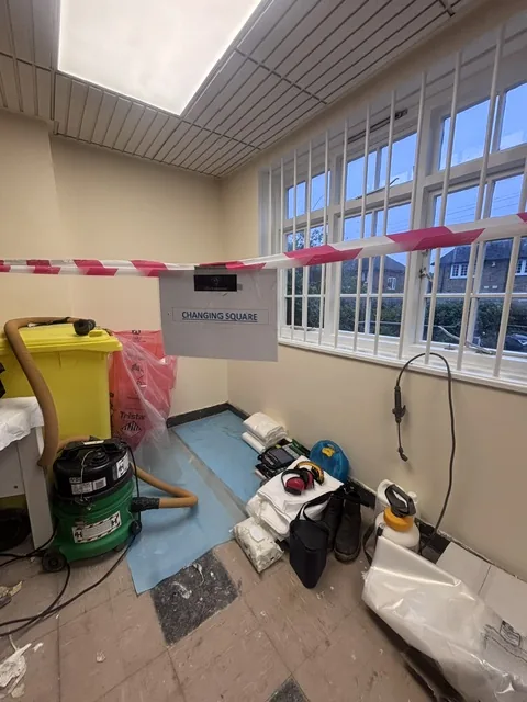 Asbestos floor tile and bitumen removal in Tooting